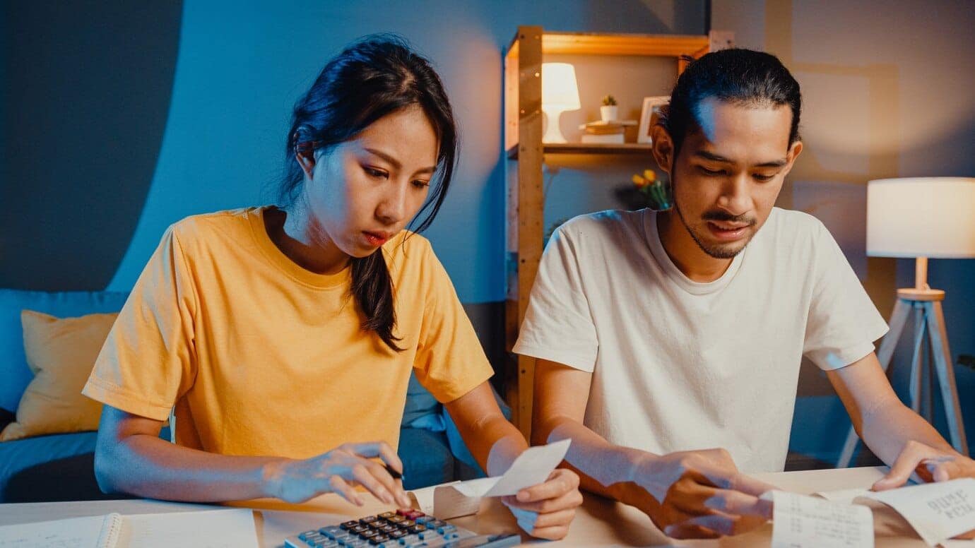 What is the process for probate in Hawaii? 7 stress asian couple man woman use calculator calculate family budget 7861 2971