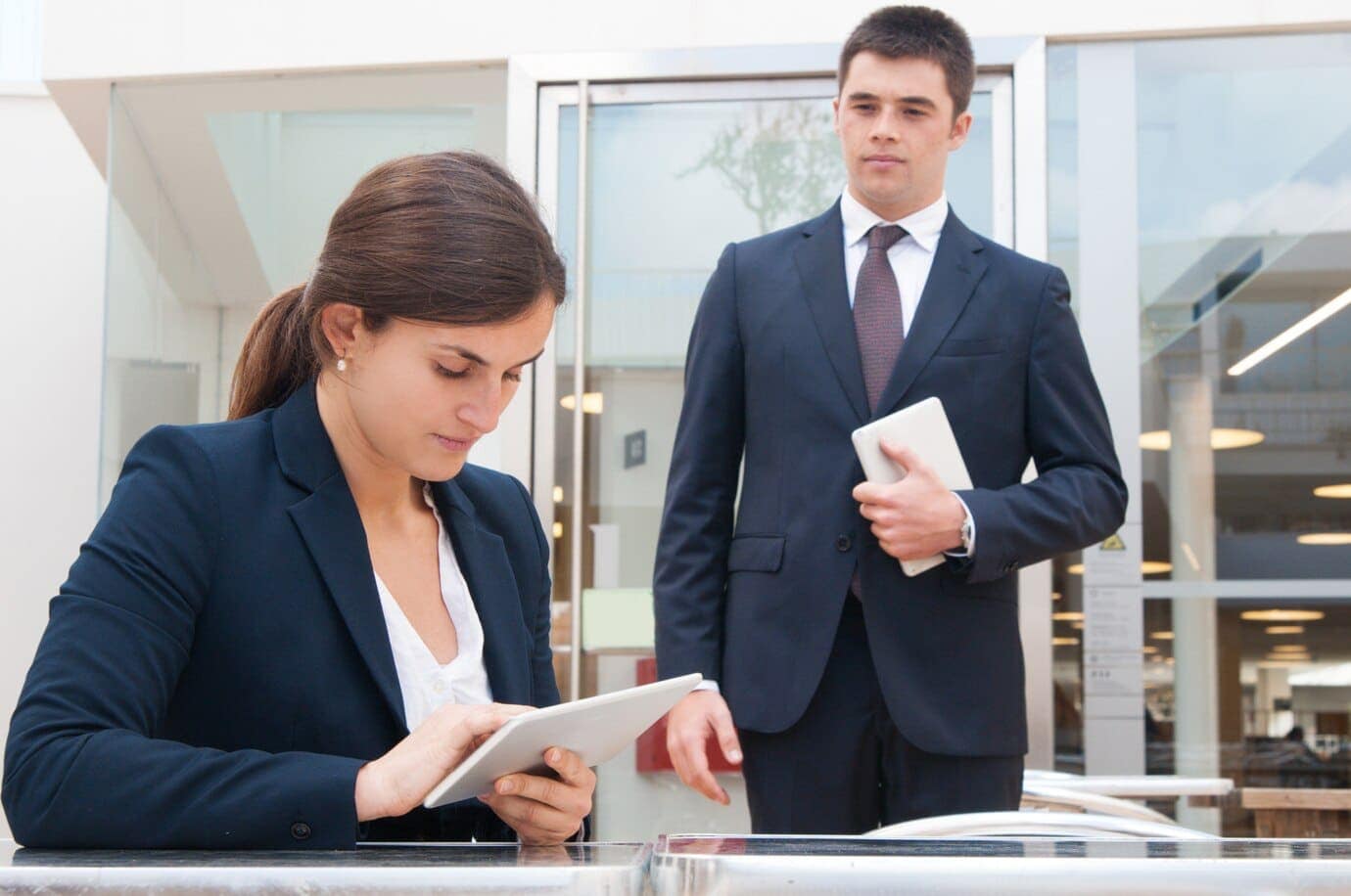What is the process for probate in Mississippi? 7 focused business woman using tablet coworker standing near 1262 20165 1