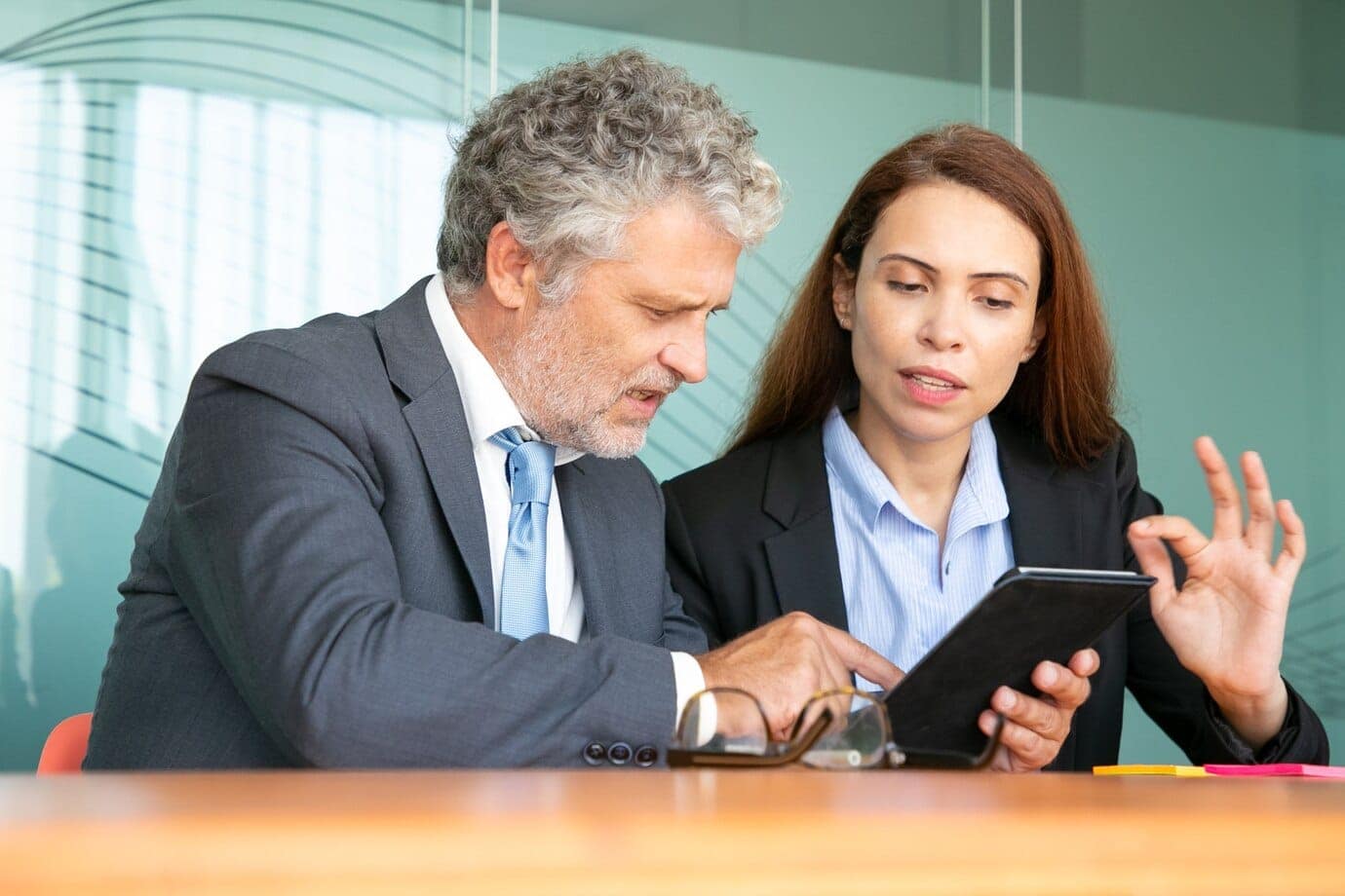 When is probate required in Connecticut? 7 businesswoman presenting project investor serious female employee showing content tablet colleague explaining details 74855 7978