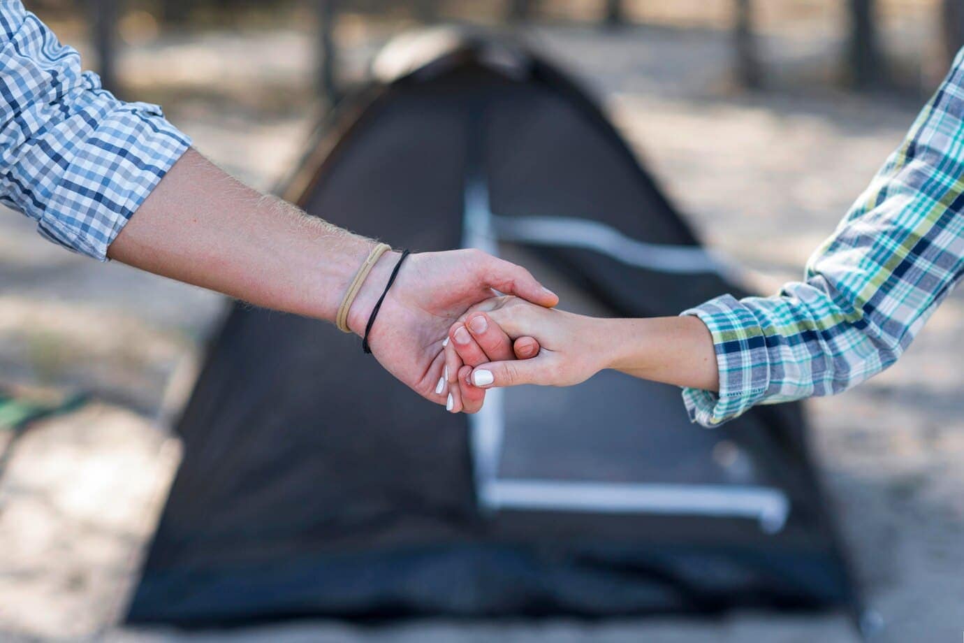 How to make a revokable trust in Colorado. 7 couple holding hands blurred tent 23 2148696916 1