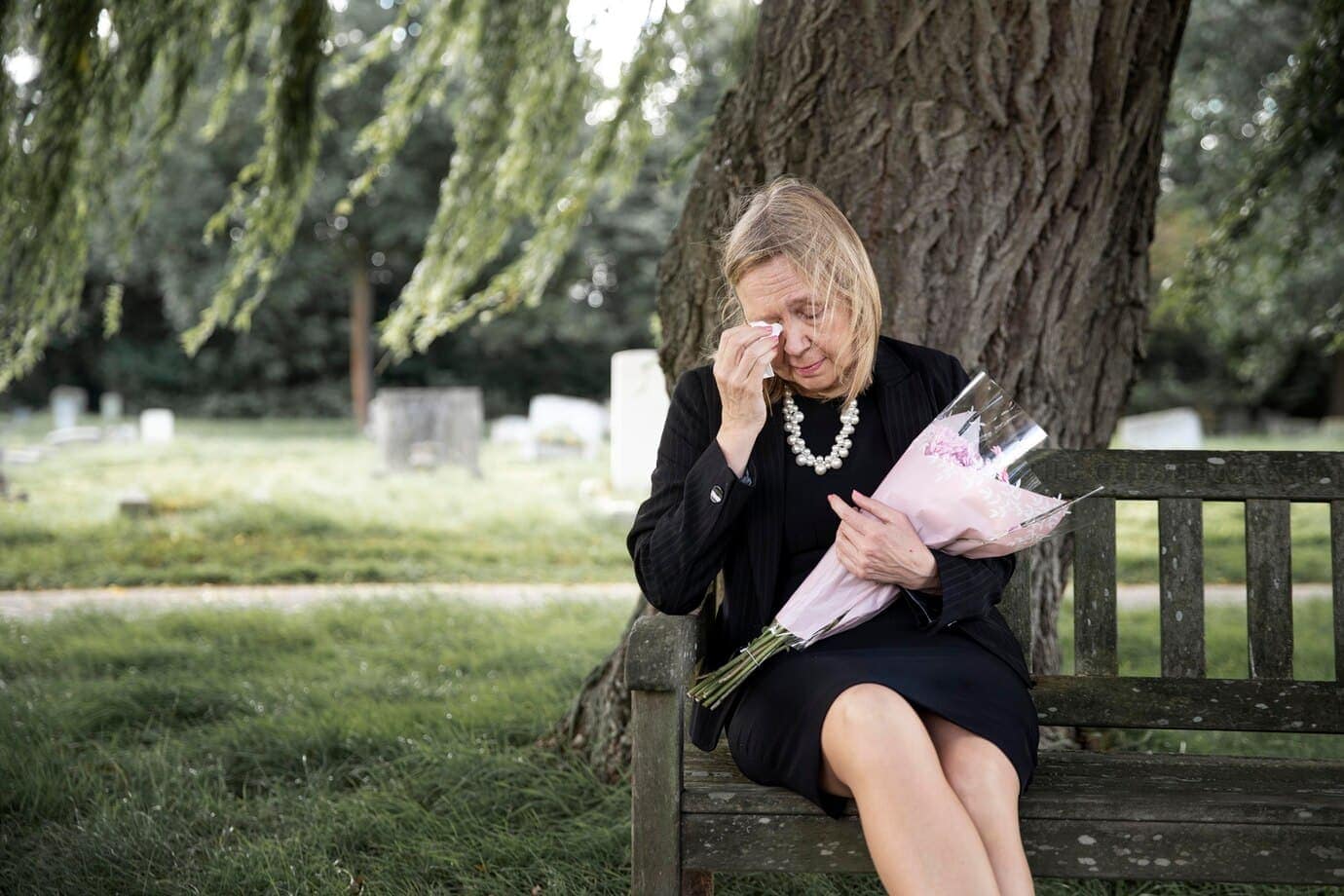 How do you get a death certificate in Massachusetts? 7 elderly woman visiting grave loved one 23 2149125600