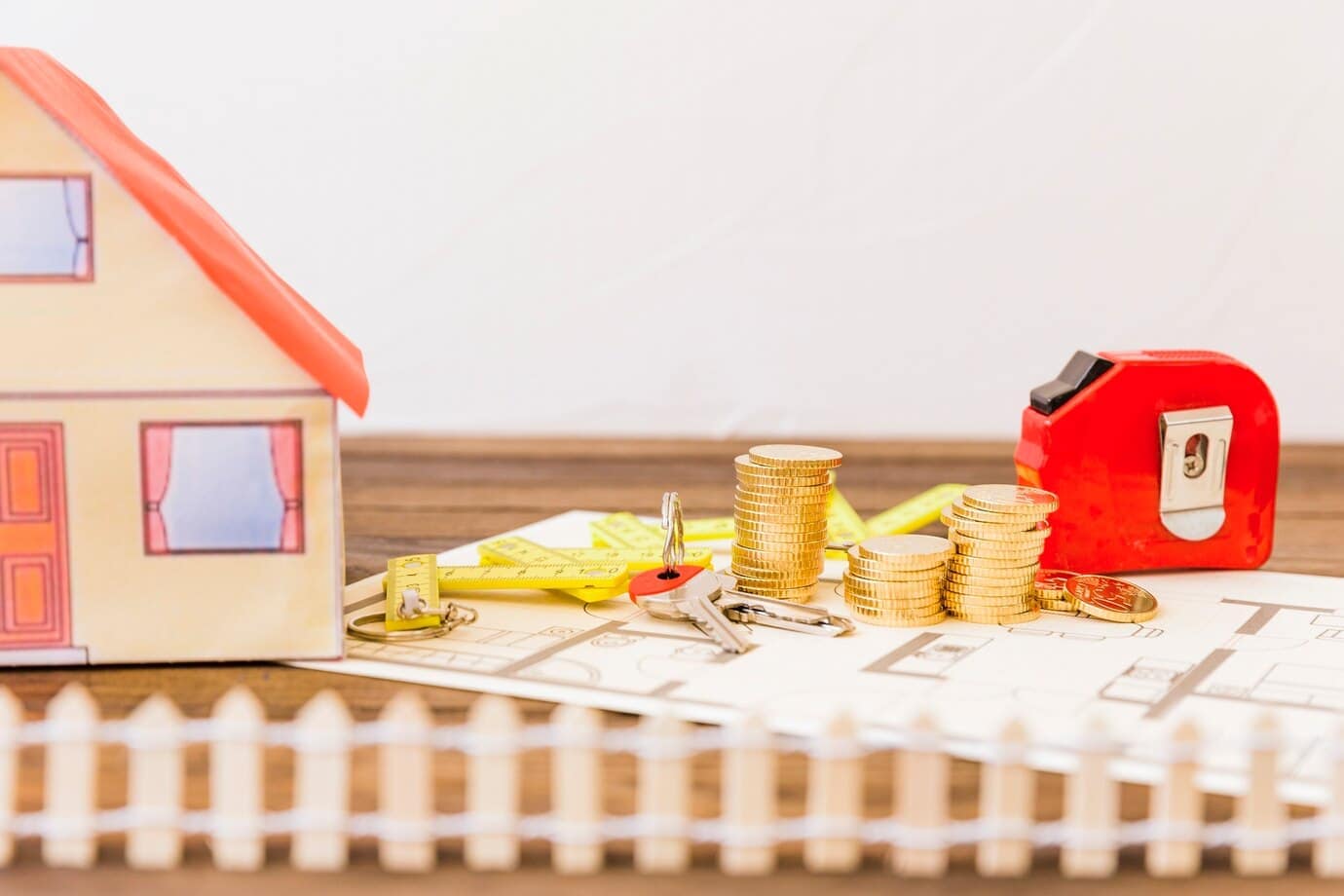 What are the inheritance and estate taxes in Georgia? 7 house besides measure tape stacked coins key blueprint 23 2147863920