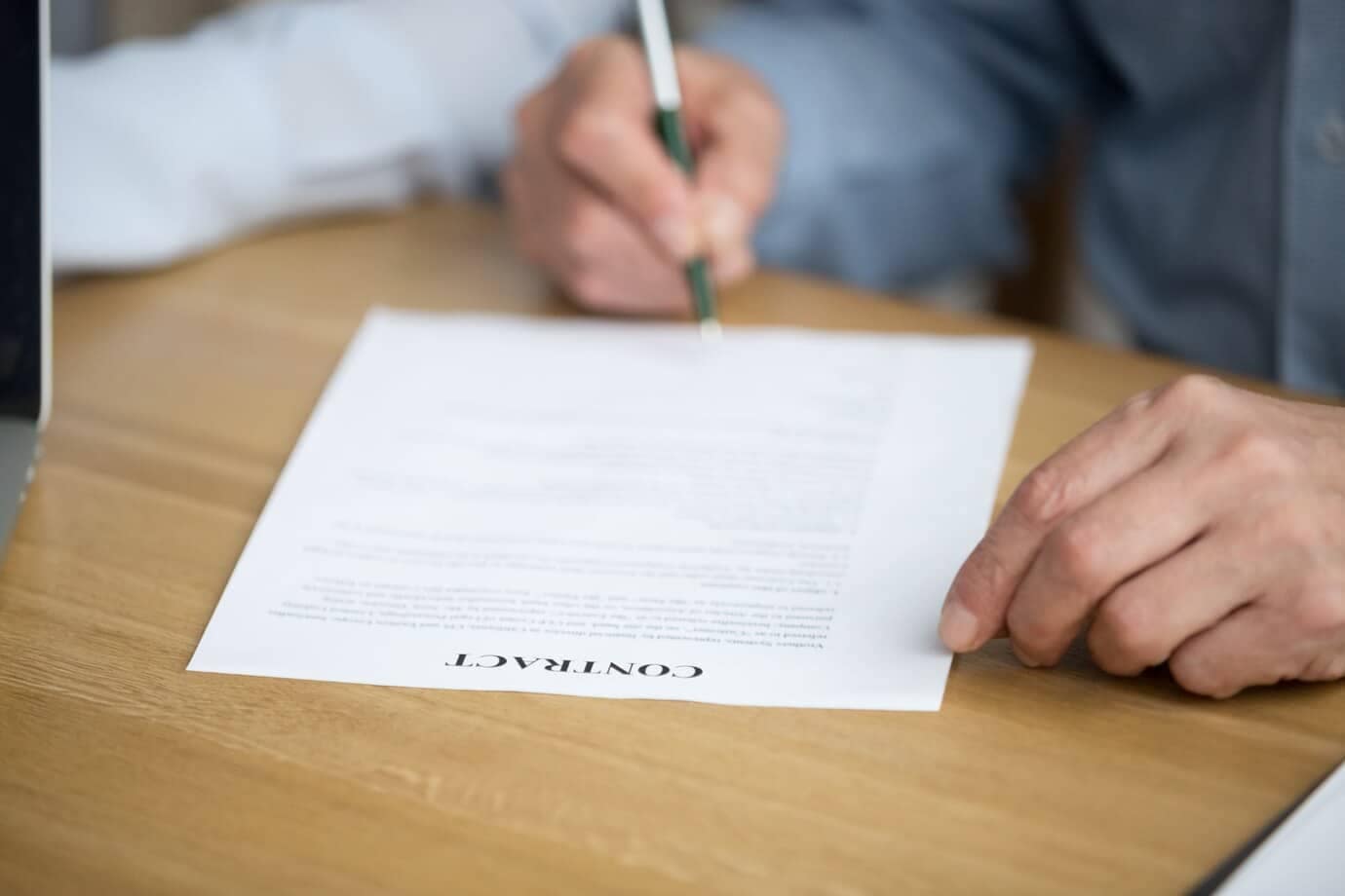 Are wills signed in other states valid in Connecticut? 7 male hand signing contract senior man putting signature document 1163 4930