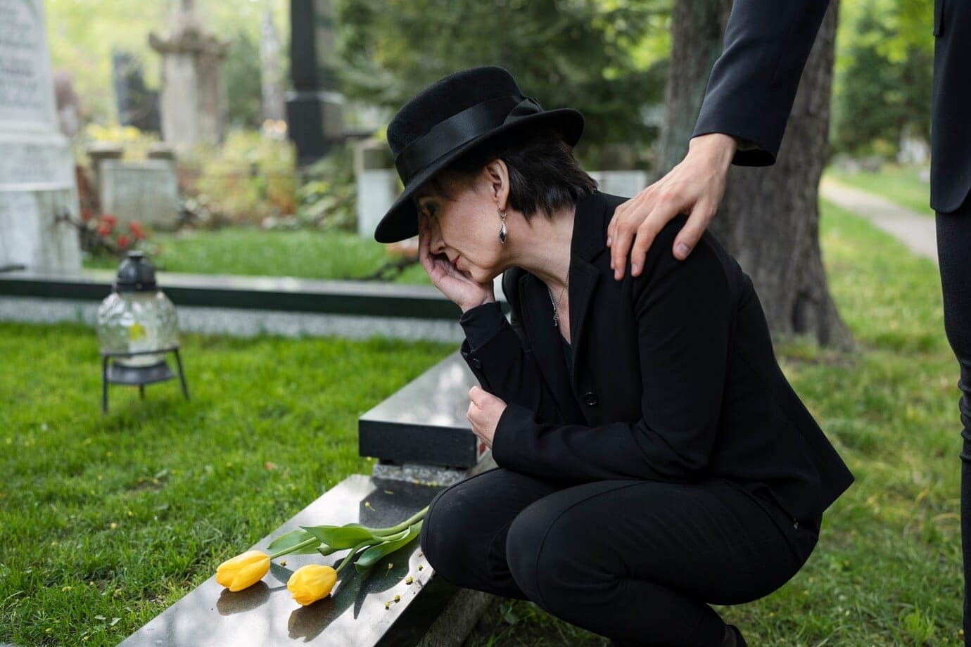 How do you order additional death certificates in Minnesota? 7 mourning woman cemetery being consoled by man 23 2149435530