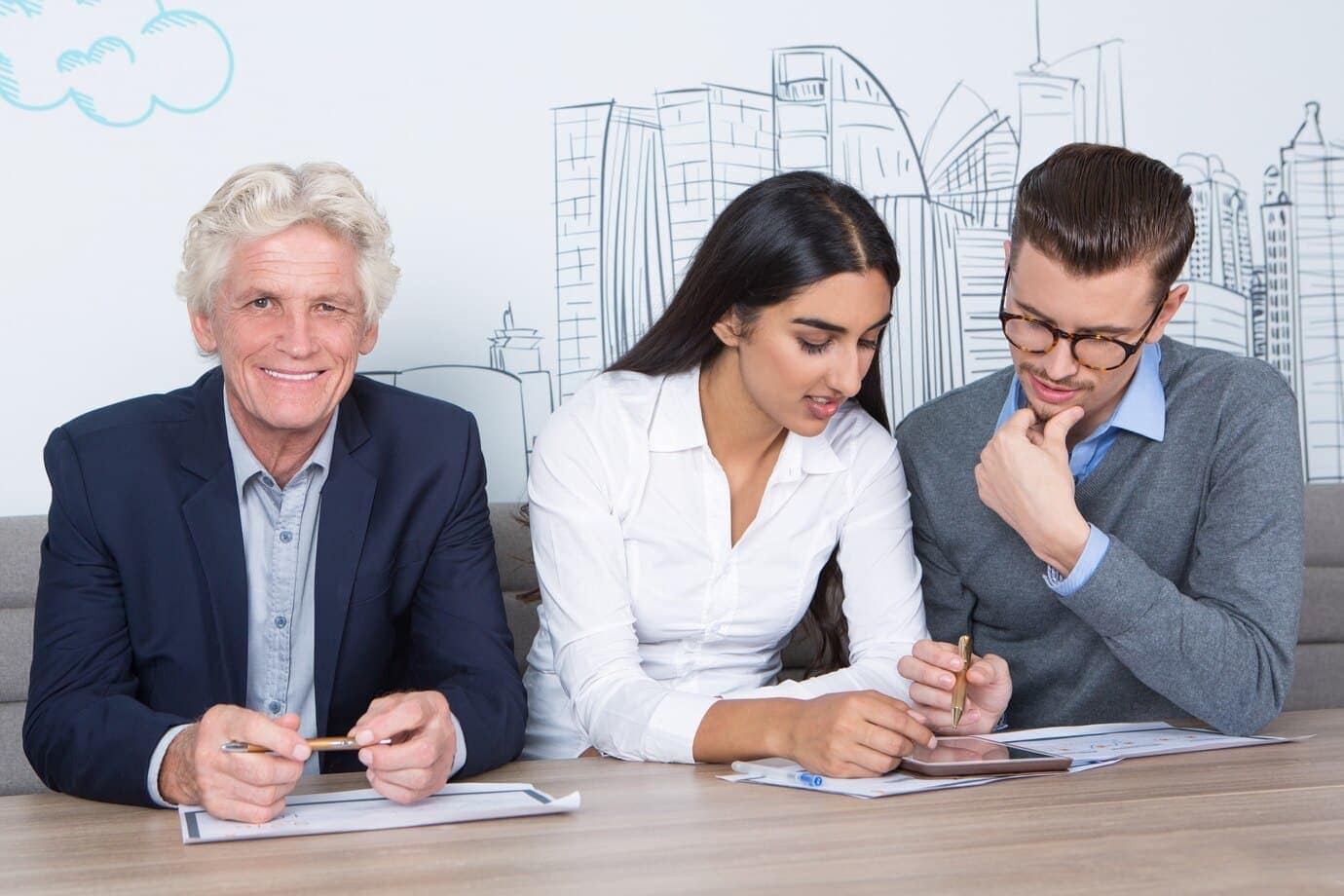 Do I Need an Estate Plan (Answer: Yes) 7 three content colleagues working cafe table 1262 2173