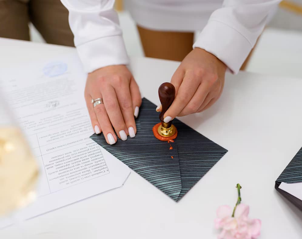 How do you get a death certificate in Vermont? 7 cropped female stamping envelope invitations 8353 12635 1